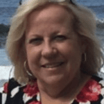 Blonde woman at seaside