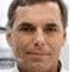 Man in white shirt, neutral expression