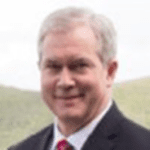 Businessman with gray hair outside