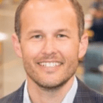Professional headshot of a man